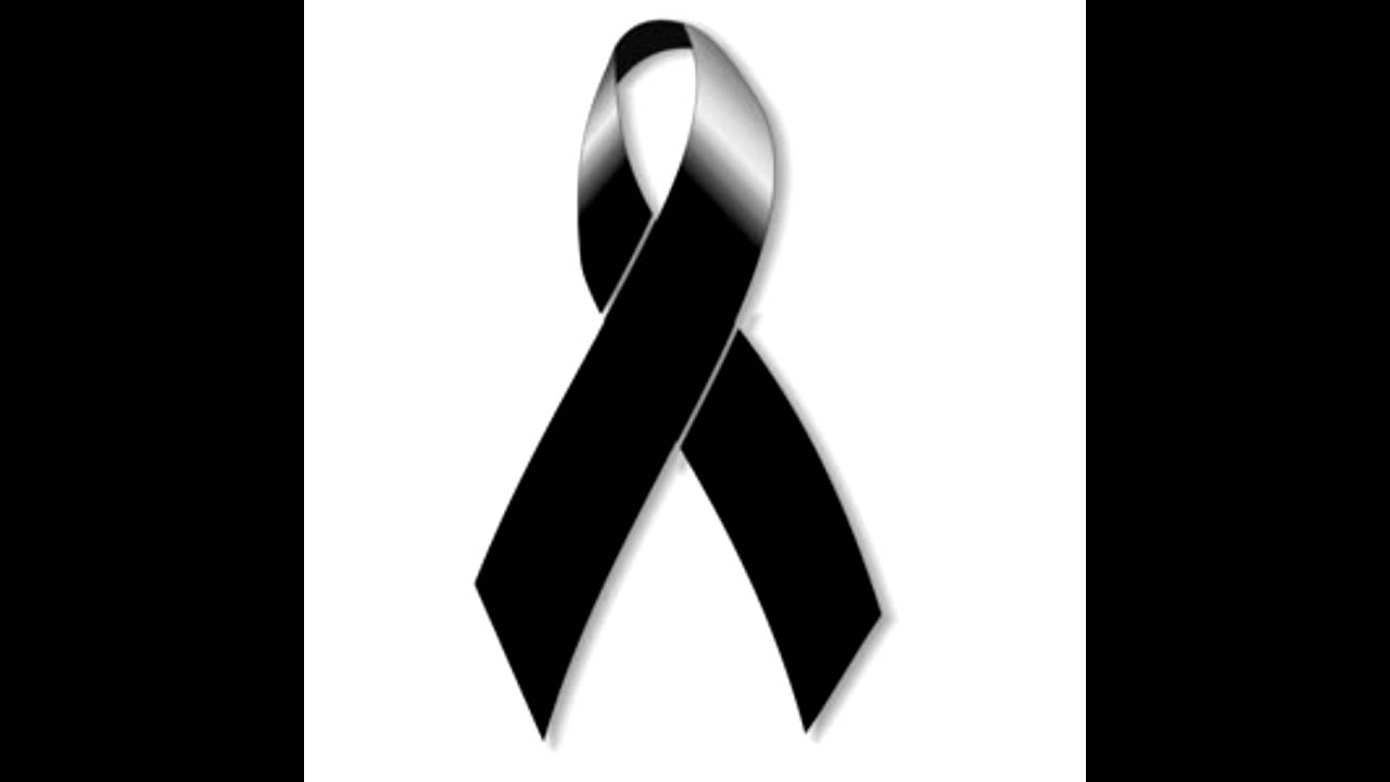 bandera roja y blanca con lazo negro